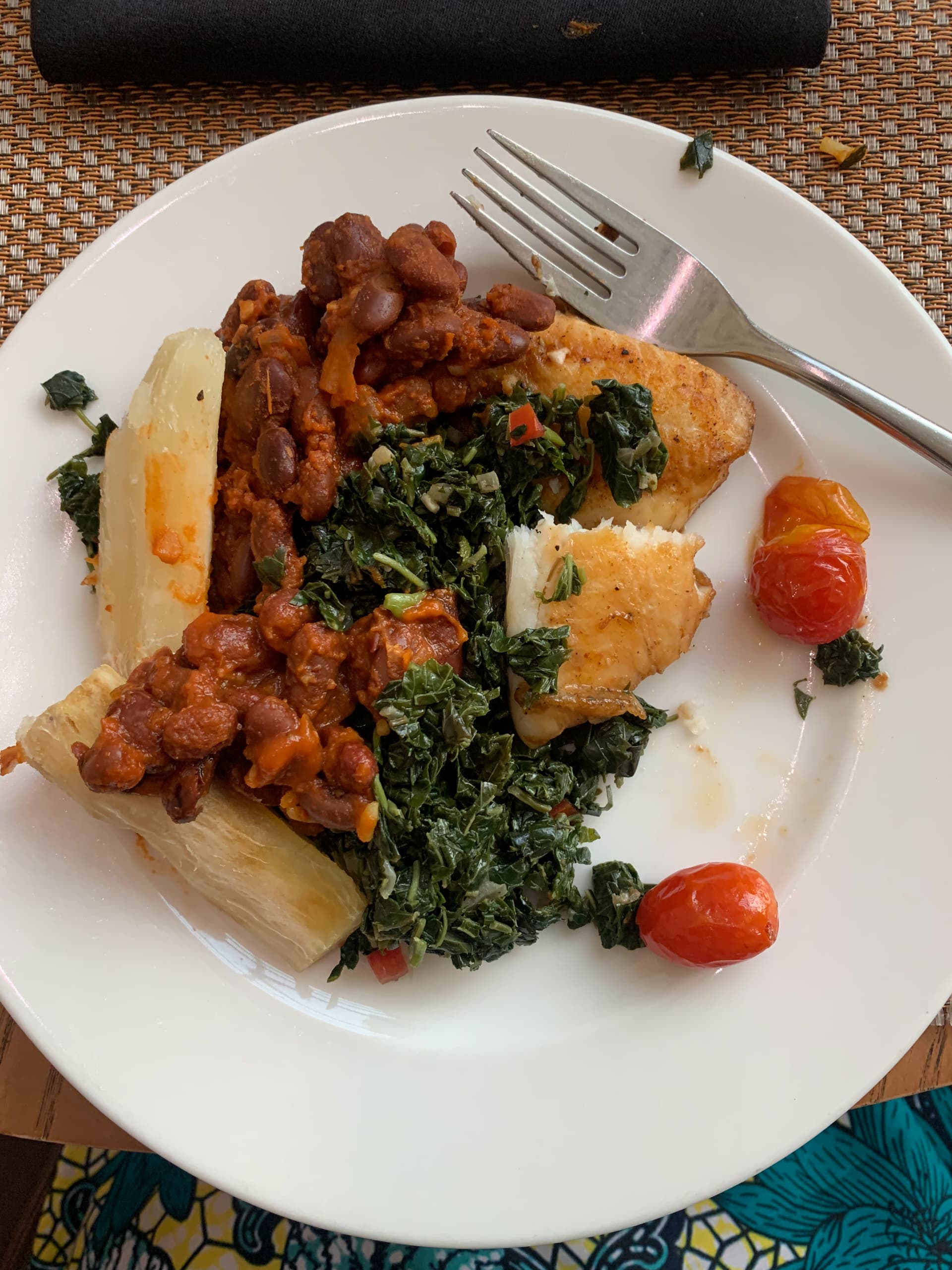Traditional Rwandan meal with beans, greens, and local staples
