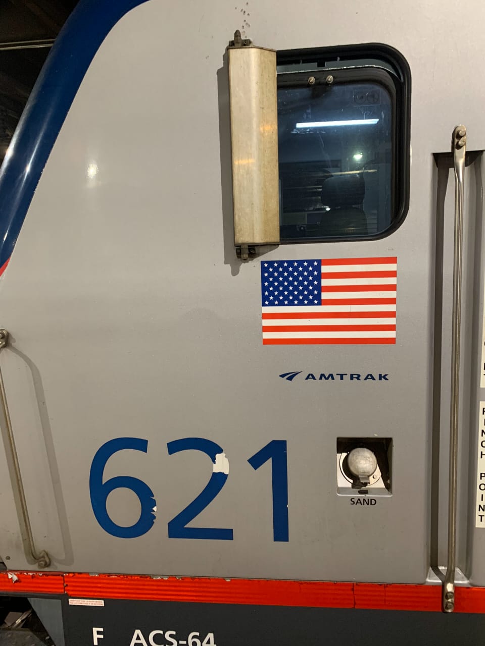 Amtrak train car #621 detail with American flag