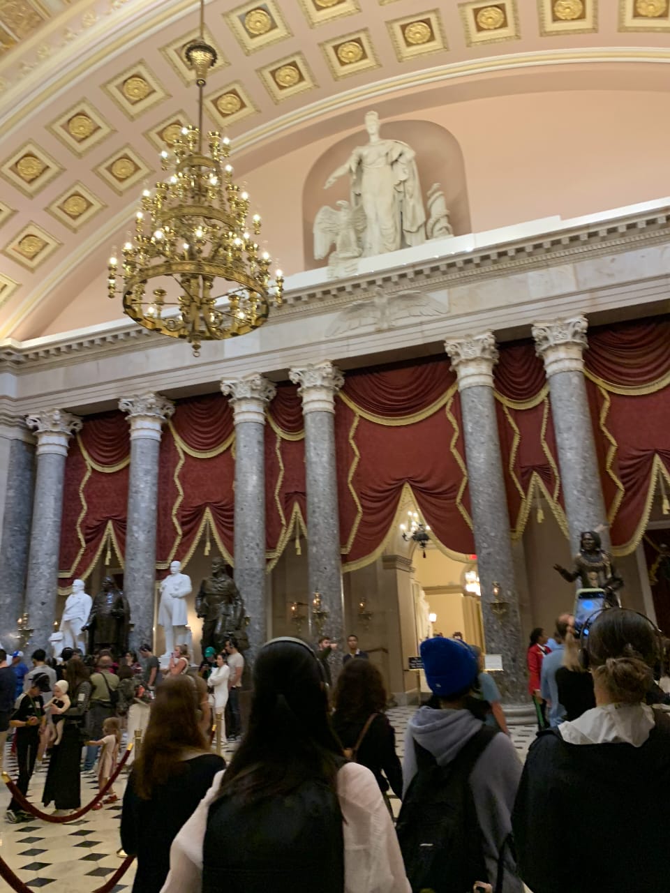 Capitol Statuary Hall with chandelier and classical statues