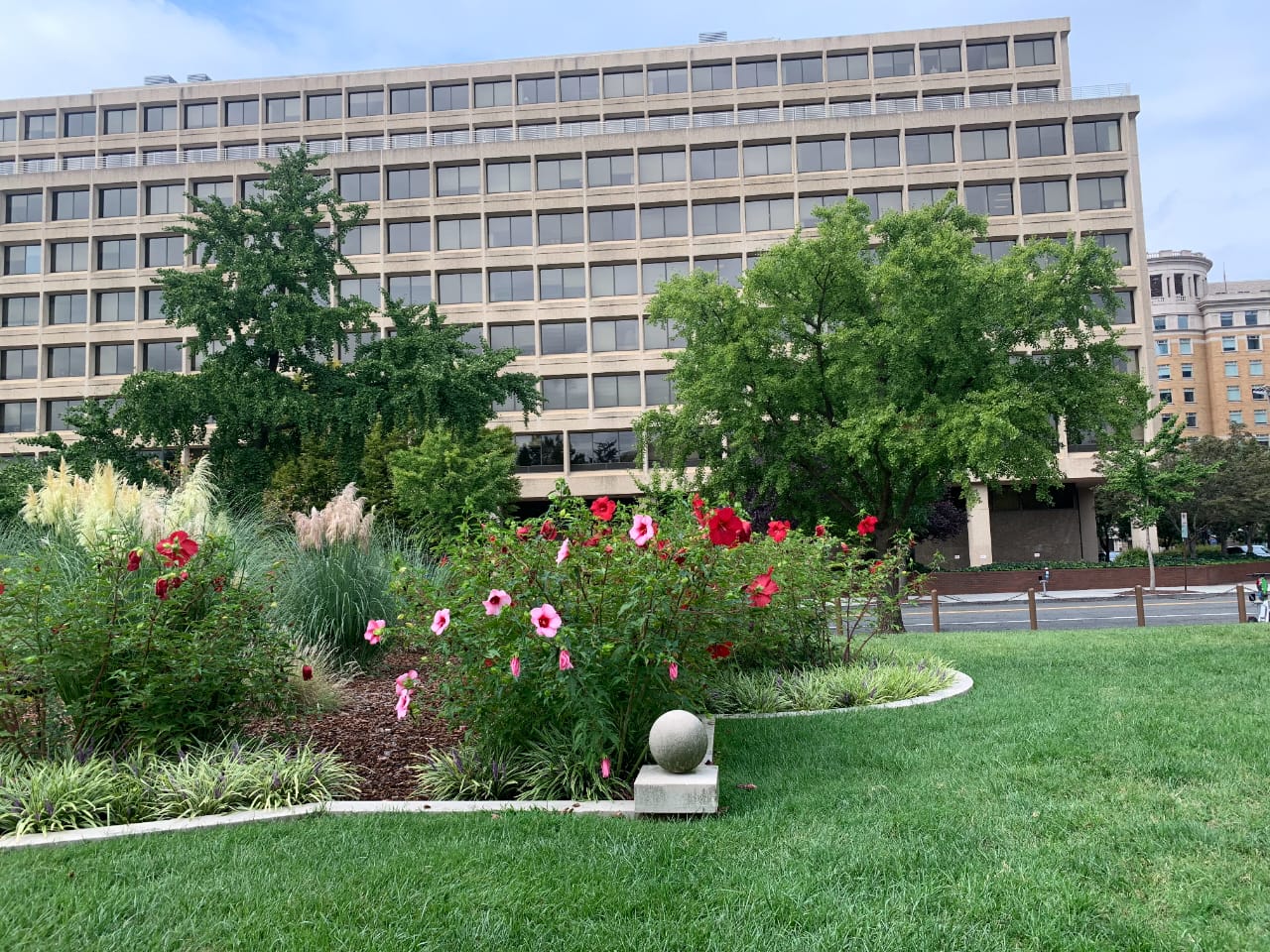 Government building with landscaped gardens and flowers