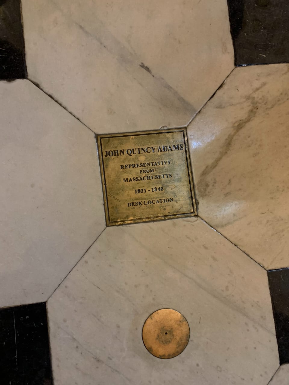 John Quincy Adams desk location plaque in the Capitol