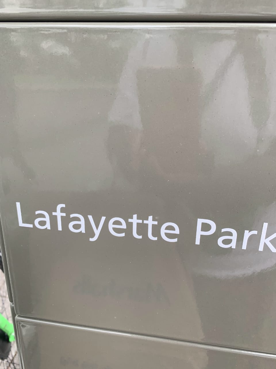 Lafayette Park sign on glass surface